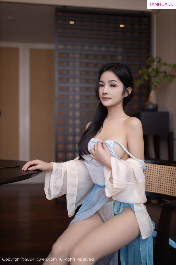   [XiuRen]高清写真图 2024.06.12 No.8691 谭小灵 丝袜美腿第6张图片